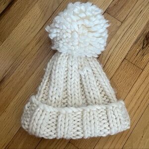 White woven winter bobble hat